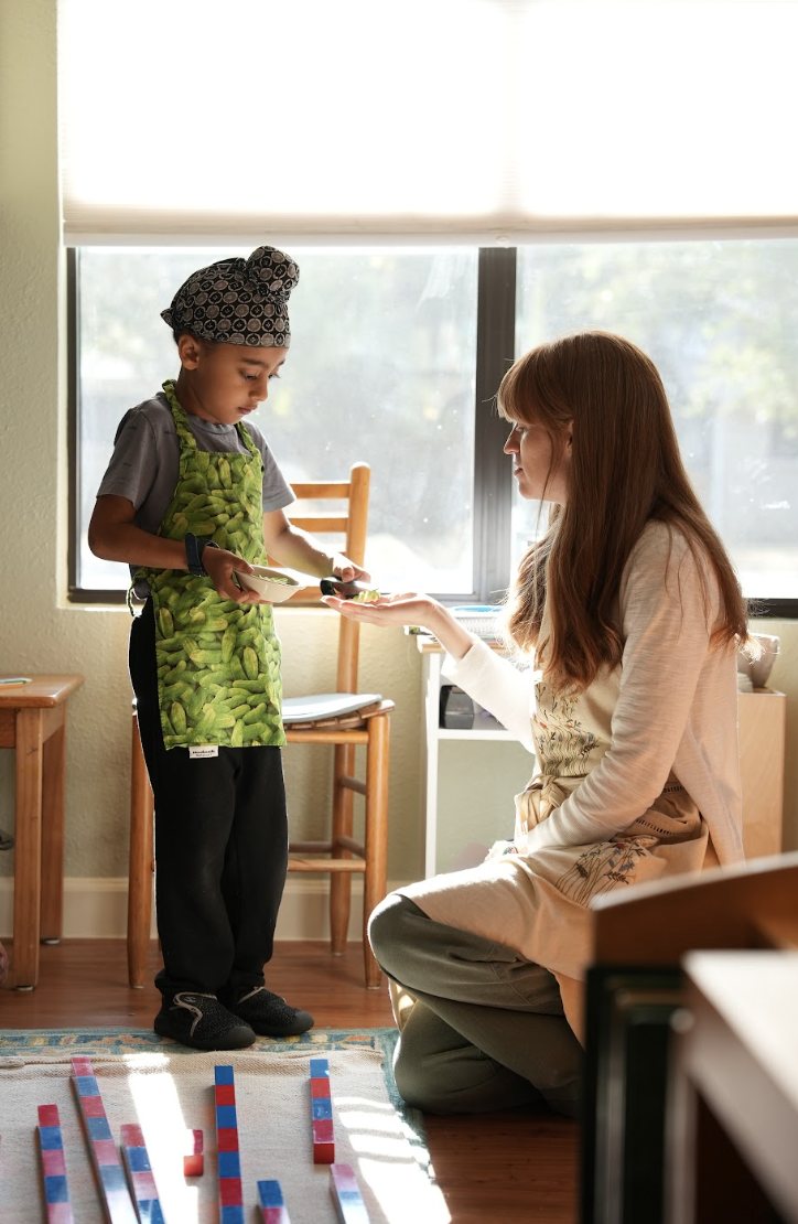 A Guide and a child at work