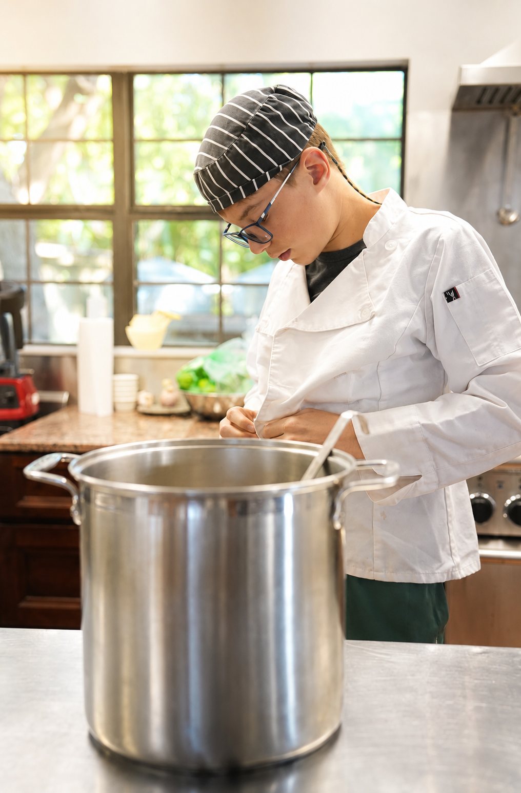 An adolescent in the kitchen